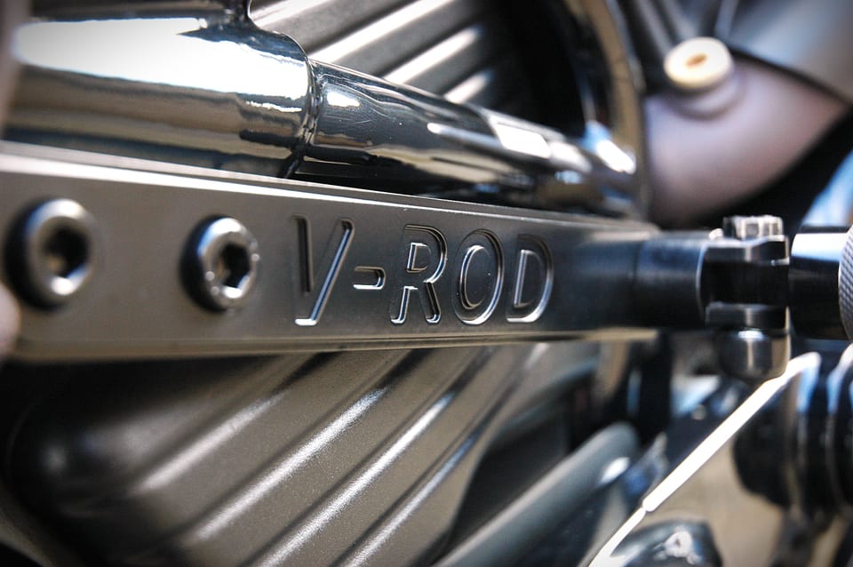 Close-up of the V-ROD lettering and metalwork on a Harley-Davidson